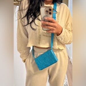 Bottega Veneta Vibrant Blue Casette Bag.